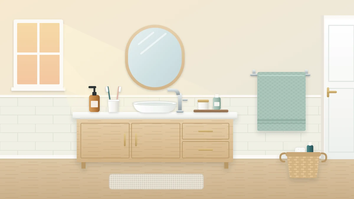 A tidy bathroom counter with a soap dispenser, a cup holding two toothbrushes and a small tray, a towel hanging open on a bar, and a basket by the door