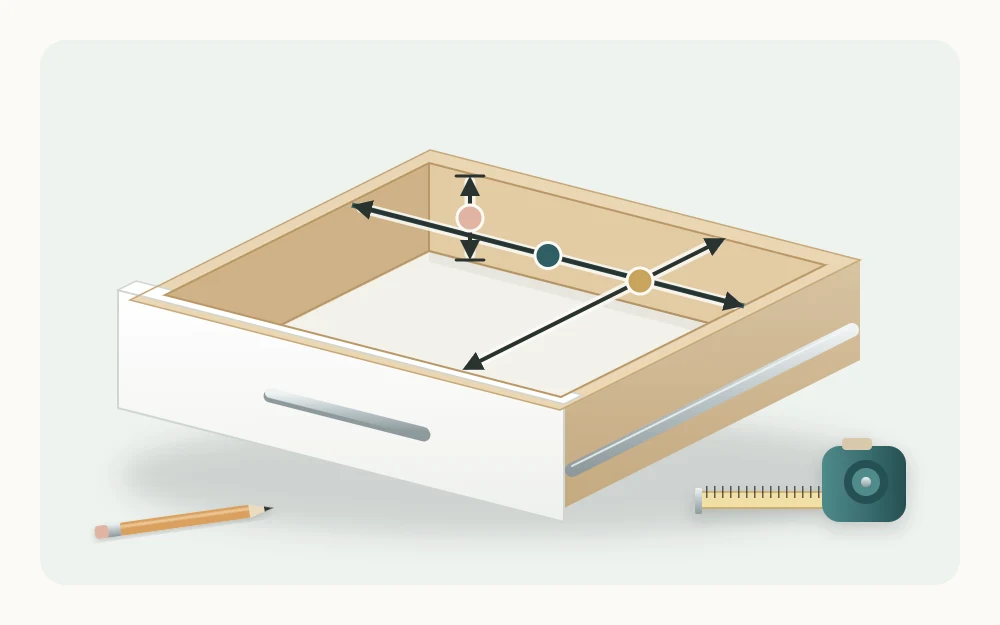 An open drawer in three-quarter view with three double-headed arrows marking inside width, inside depth and usable height