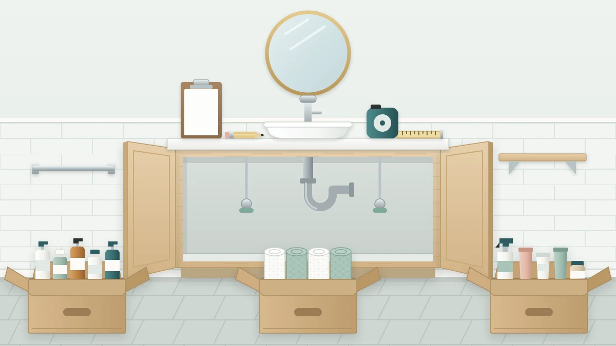 A bathroom mid-project with an emptied vanity, three open boxes of sorted bottles and towels, a clipboard, a pencil and a tape measure